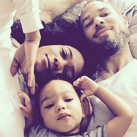A picture of Tatyana Ali with her husband and son, Edward.